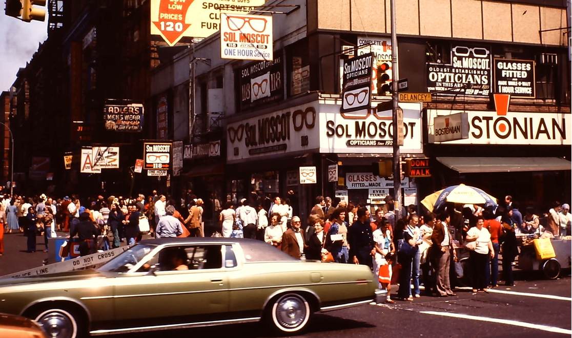 MOSCOT store on a busy street corner in 1976