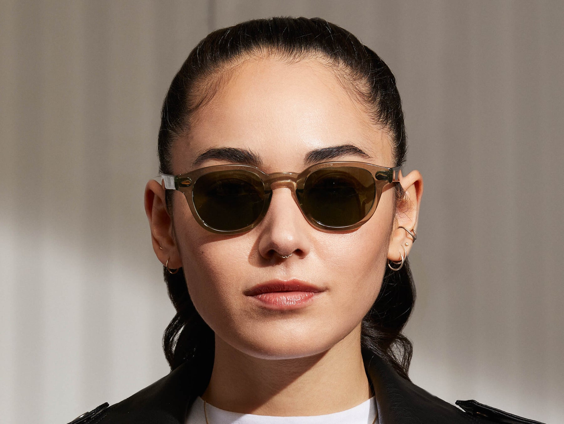 Model is wearing The LEMTOSH SUN in Sage in size 44 with G-15 Glass Lenses
