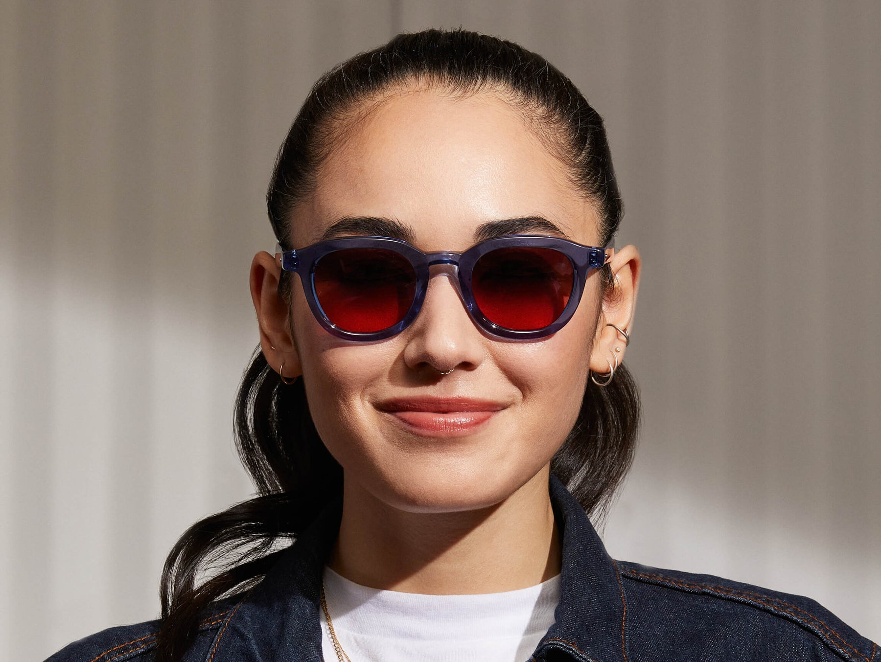 Model is wearing The DAHVEN in Sapphire in size 47 with Cabernet Tinted Lenses