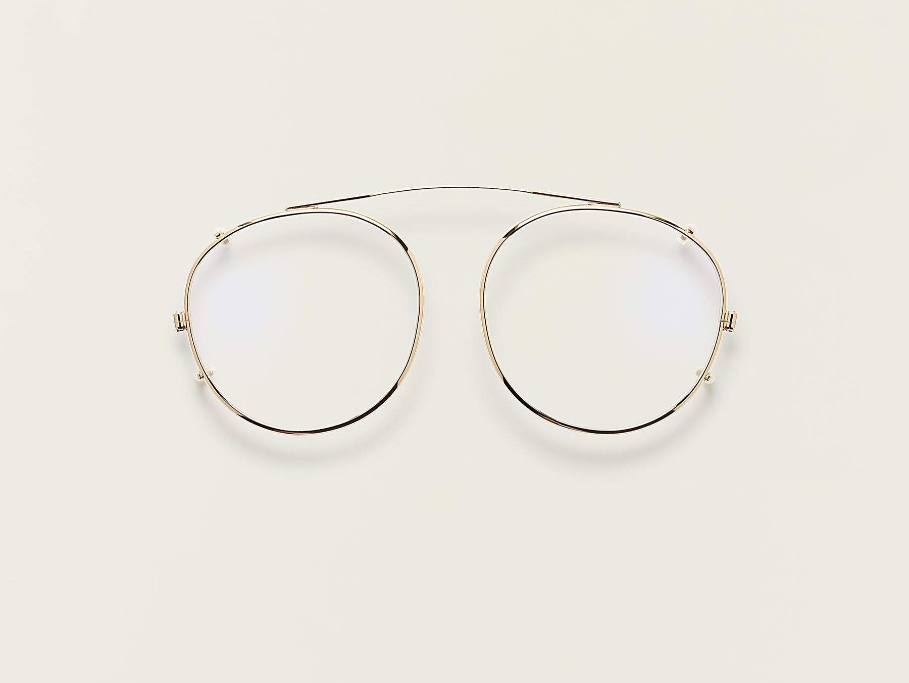 The ZEV CLIP in Gold with Blue Protect Lenses