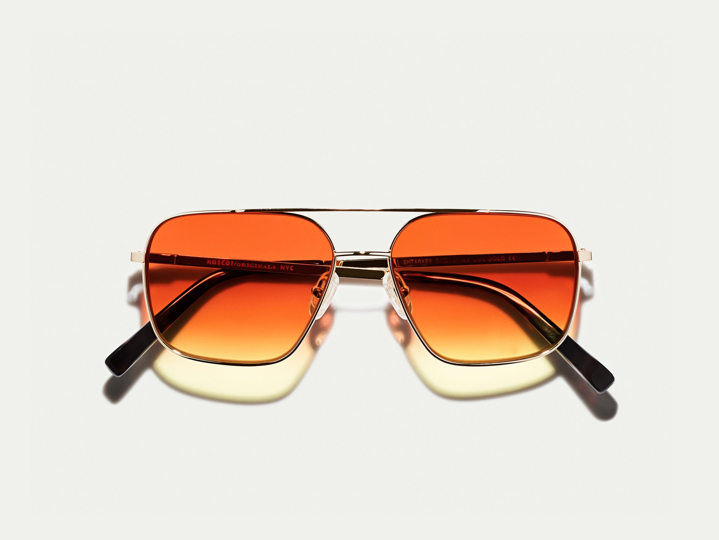 The SHTARKER in Gold with Candy Corn Tinted Lenses