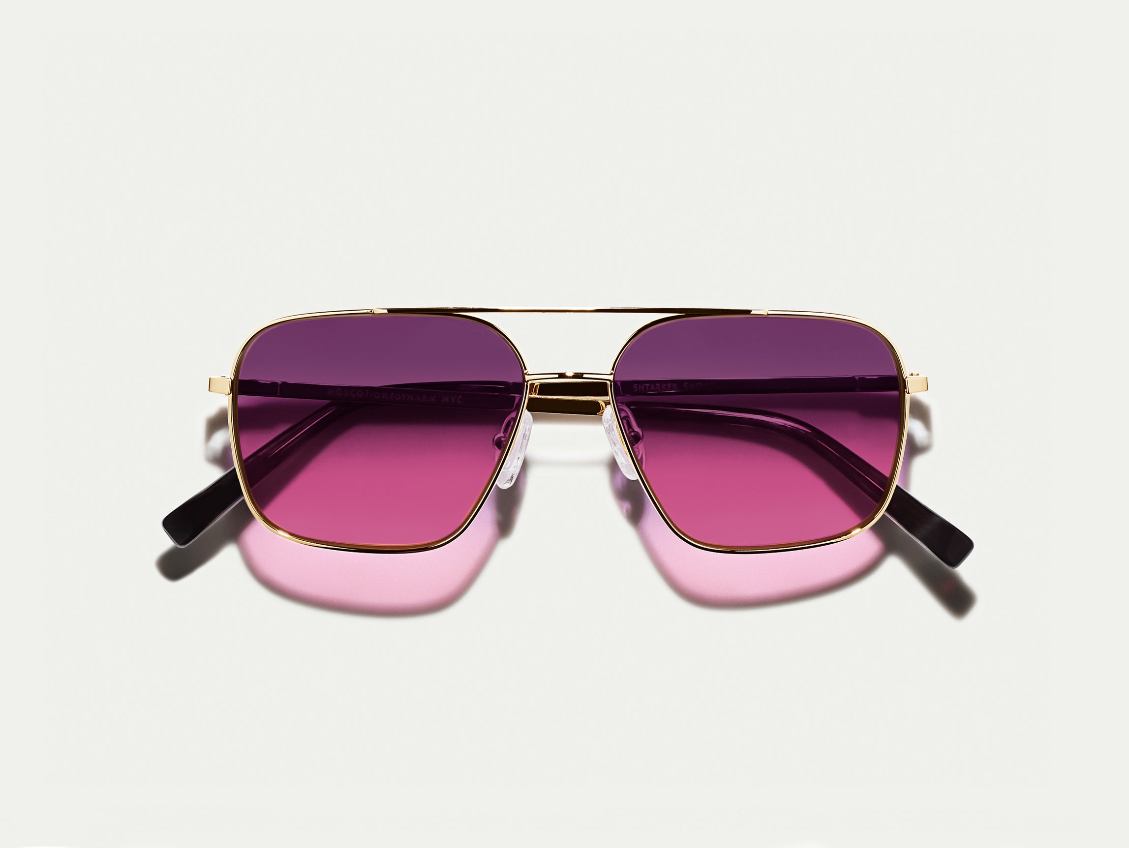 The SHTARKER in Gold with Westside Sunset Tinted Lenses