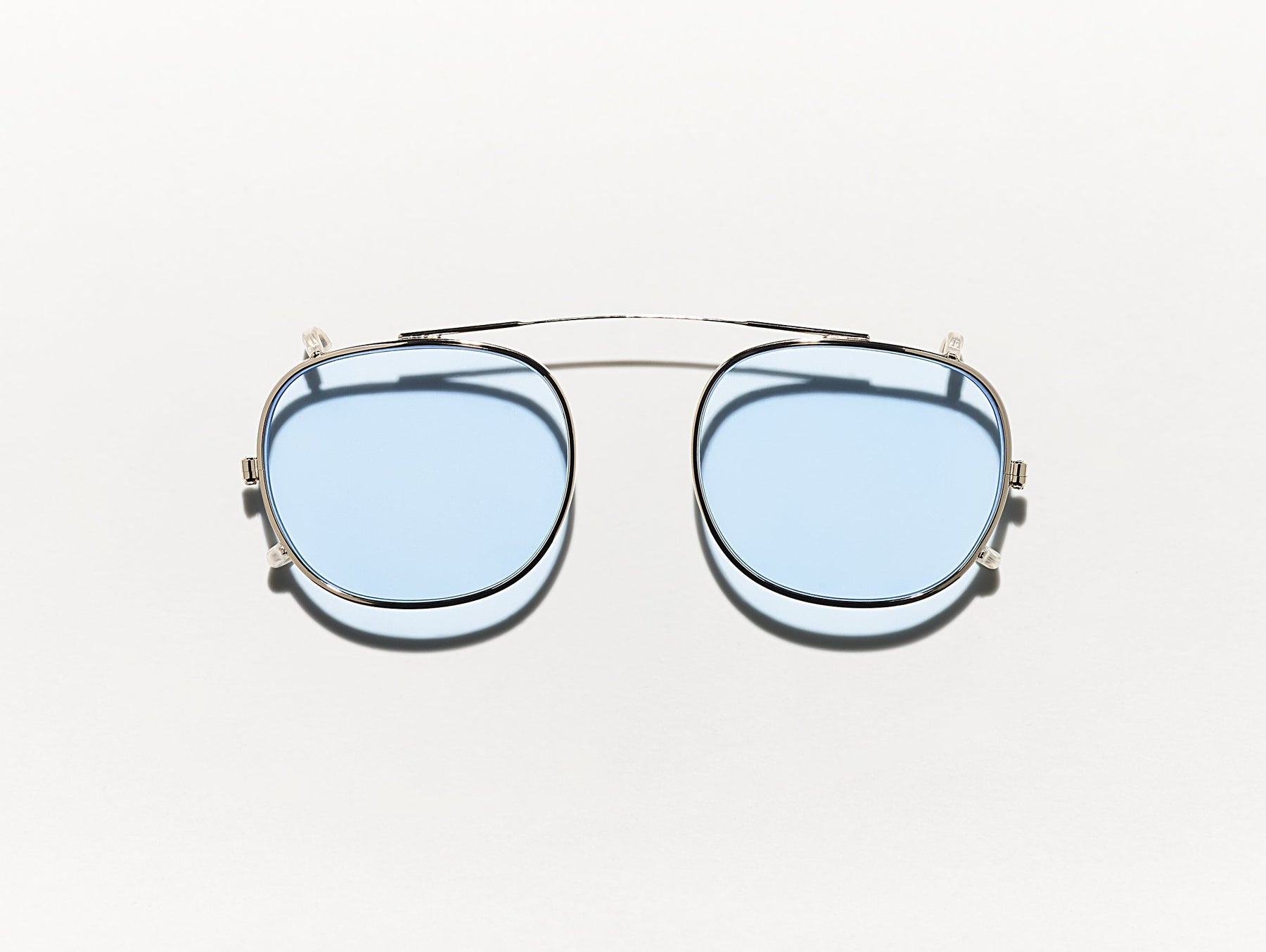 The CLIPTOSH in Gold with Bel Air Blue Tinted Lenses