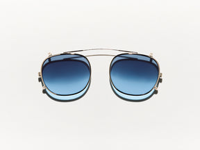 The CLIPTOSH in Gold with Denim Blue Tinted Lenses