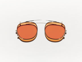The CLIPTOSH in Gold with Woodstock Orange Tinted Lenses
