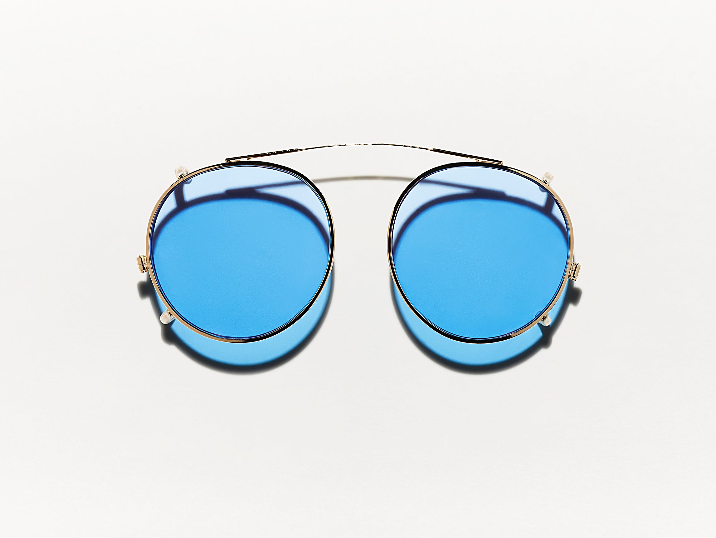#color_celebrity blue | The CLIPZEN in Gold with Celebrity Blue Tinted Lenses
