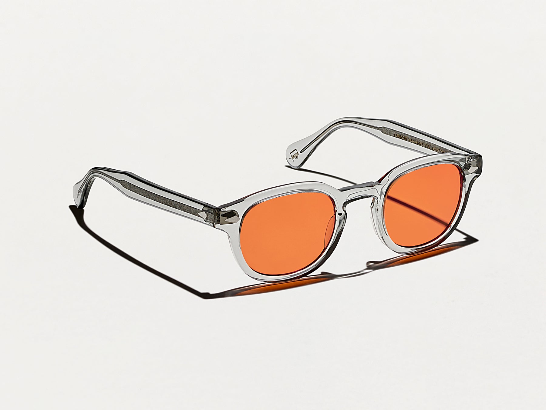 The LEMTOSH Light Grey with Woodstock Orange Tinted Lenses