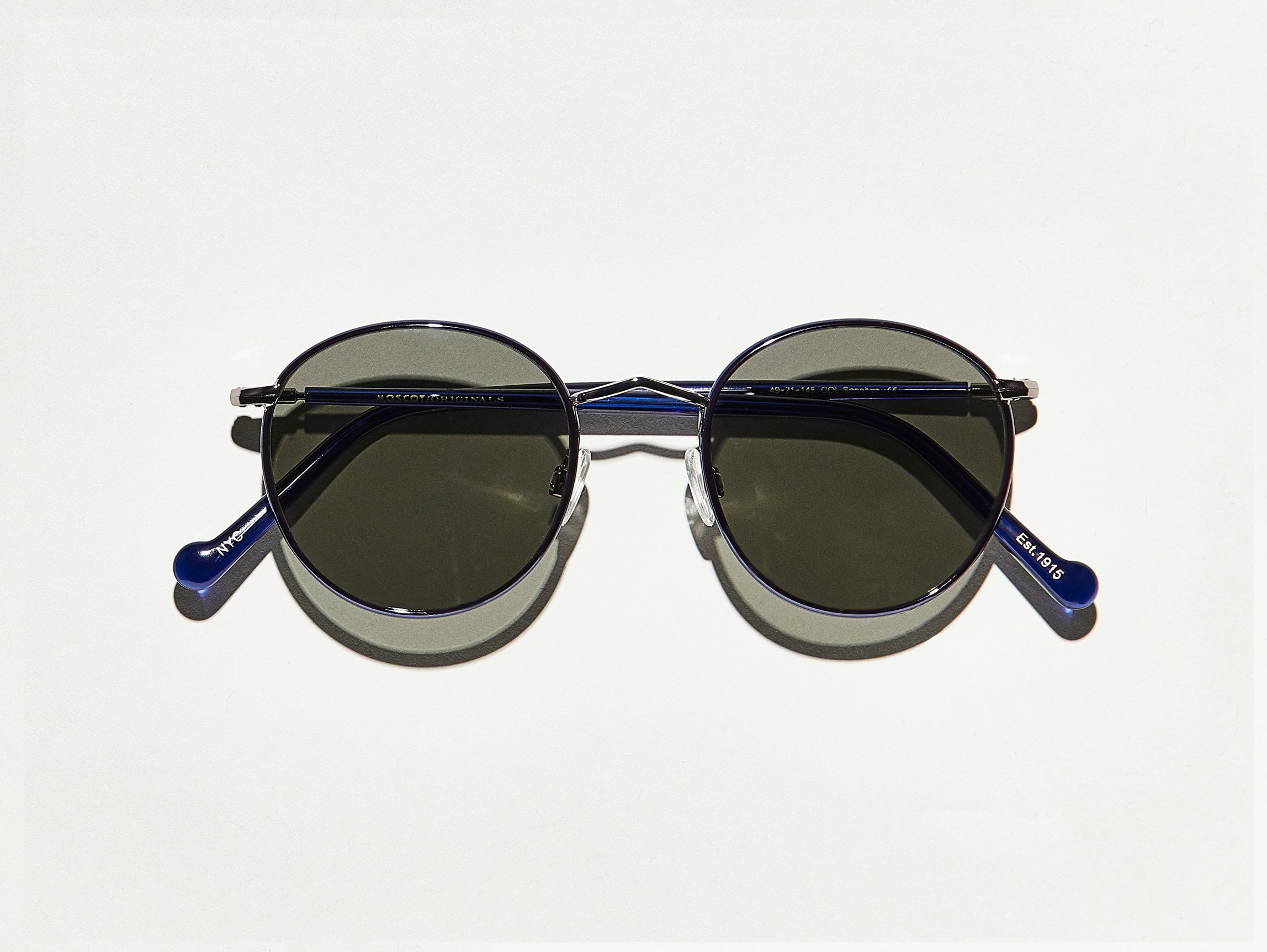 The ZEV SUN in Sapphire/Pewter with Grey Glass Lenses
