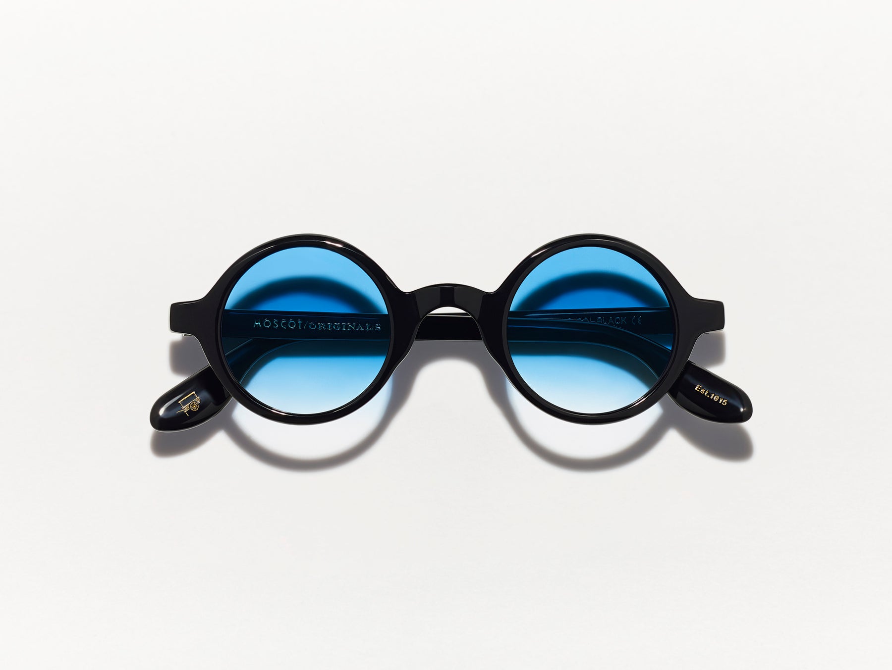 The ZOLMAN in Black with Broadway Blue Fade Tinted Lenses