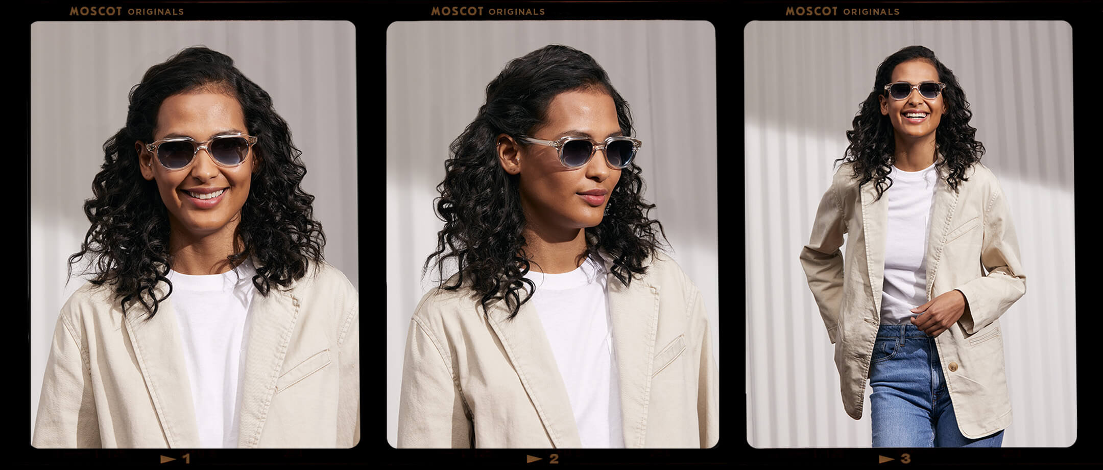 Model is wearing The GOOLAH SUN in Crystal in size 50 with Denim Blue Tinted Lenses