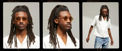 Model is wearing The PLOTZ SUN in size 49 in Gold with Amber Tinted Lenses