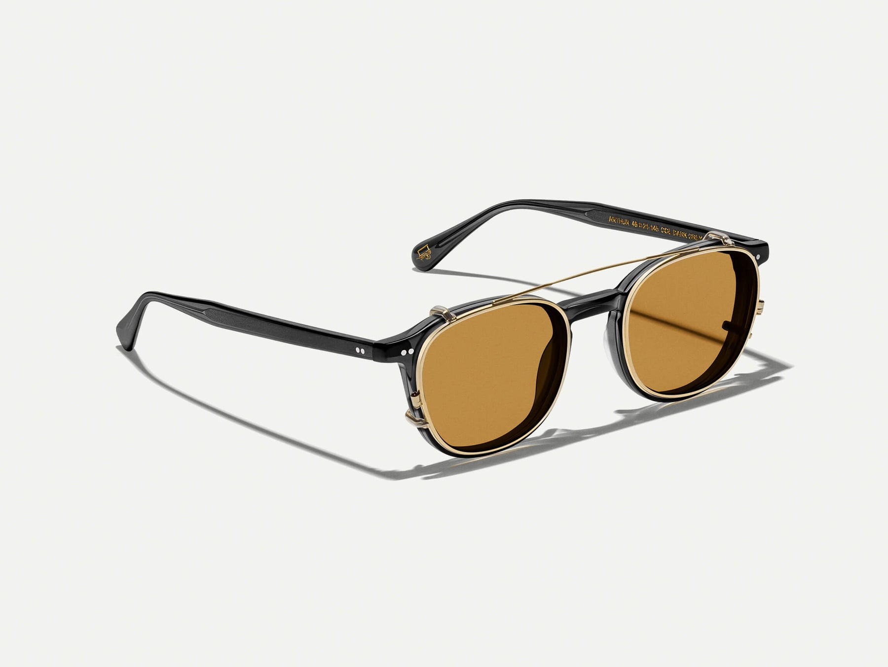 The ARTHUR CLIP  in Gold with Amber Tinted Lenses