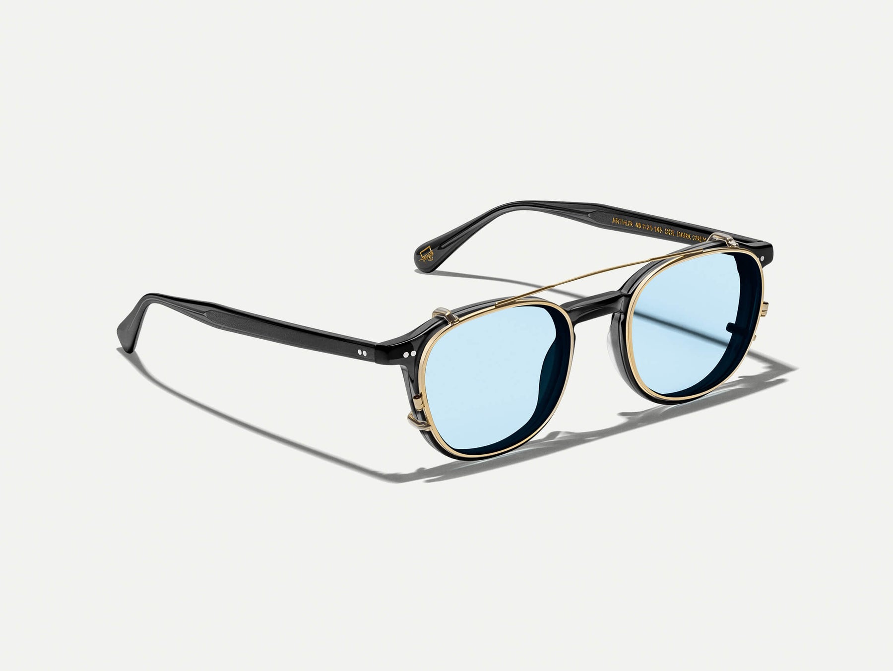 The ARTHUR CLIP  in Gold with Bel Air Blue Tinted Lenses