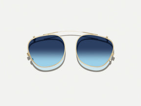 #color_denim blue | The ARTHUR CLIP  in Gold with Denim Blue Tinted Lenses 