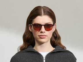 Model is wearing The ARTHUR in Burgundy in size 51 with Cabernet Tinted Lenses