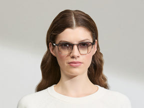 Model is wearing The ARTHUR in Charcoal in size 51 with American Grey Fade Tinted Lenses
