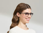 Model is wearing The ARTHUR in Charcoal in size 51 with American Grey Fade Tinted Lenses