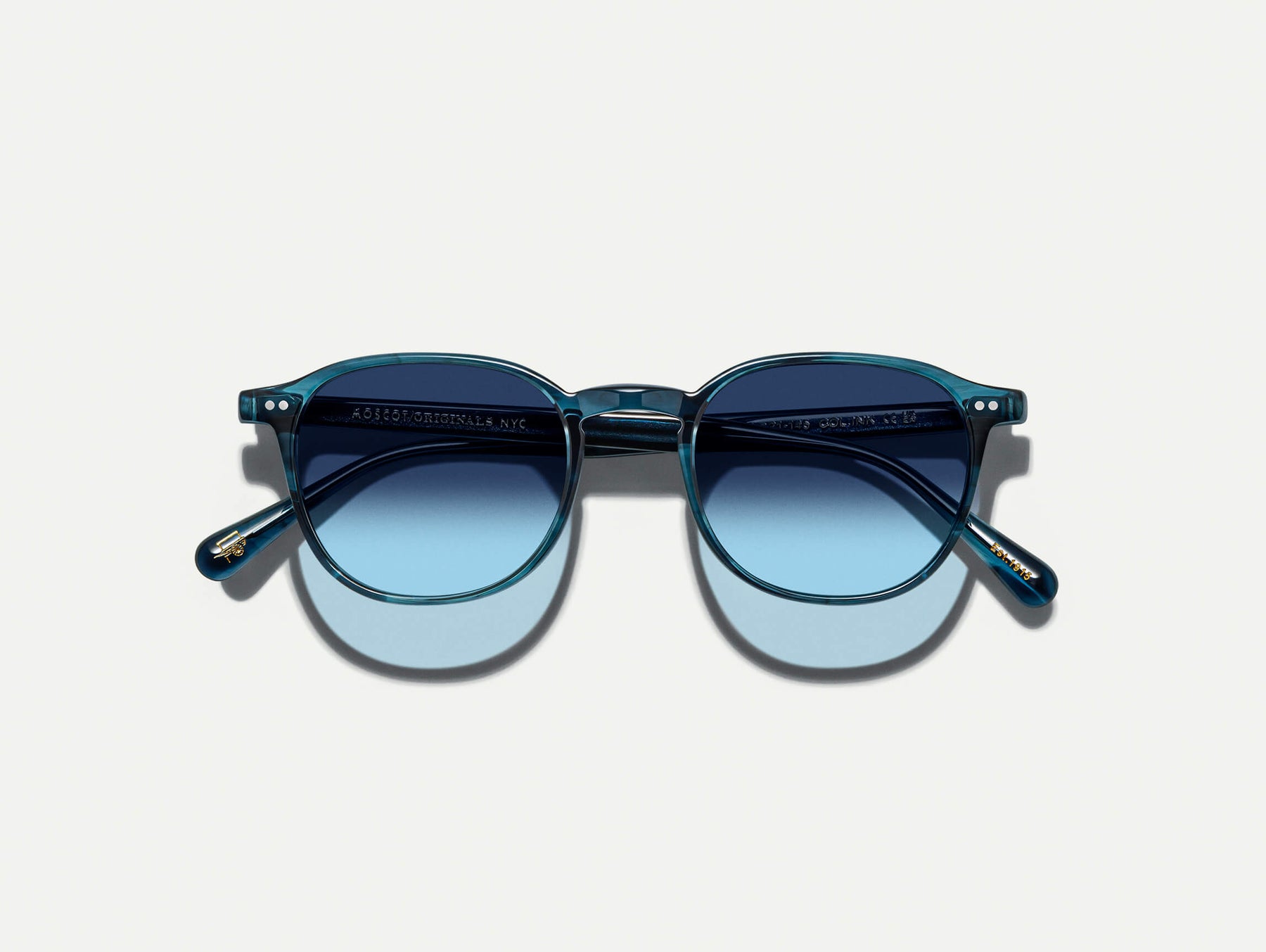The ARTHUR SUN in Ink with Denim Blue Tinted Lenses