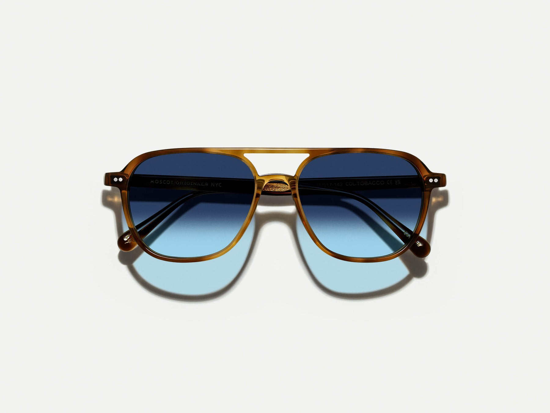 The BJORN SUN in Tobacco with Denim Blue Tinted Lenses