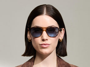 Model is wearing The BJORN SUN in Tobacco in size 58 with Denim Blue Tinted Lenses