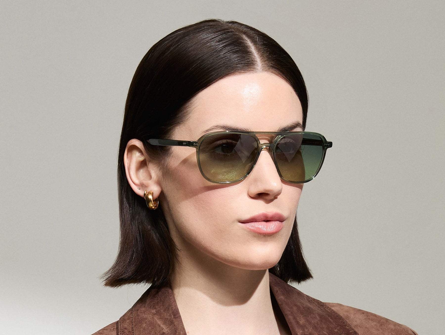 Model is wearing The BJORN SUN in Pine in size 58 with Forest Wood Tinted Lenses