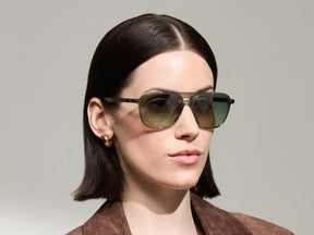 Model is wearing The BJORN SUN in Pine in size 58 with Forest Wood Tinted Lenses