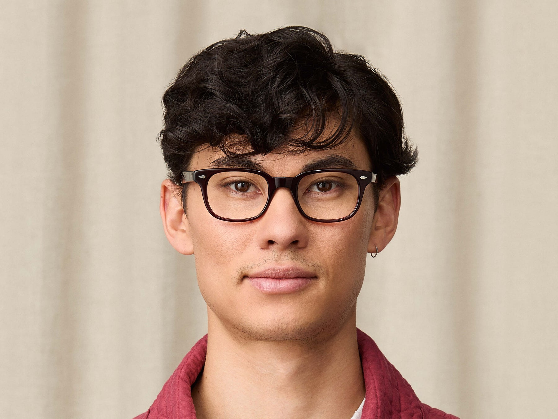 Model is wearing The BOYCHIK in size 49 in Burgundy