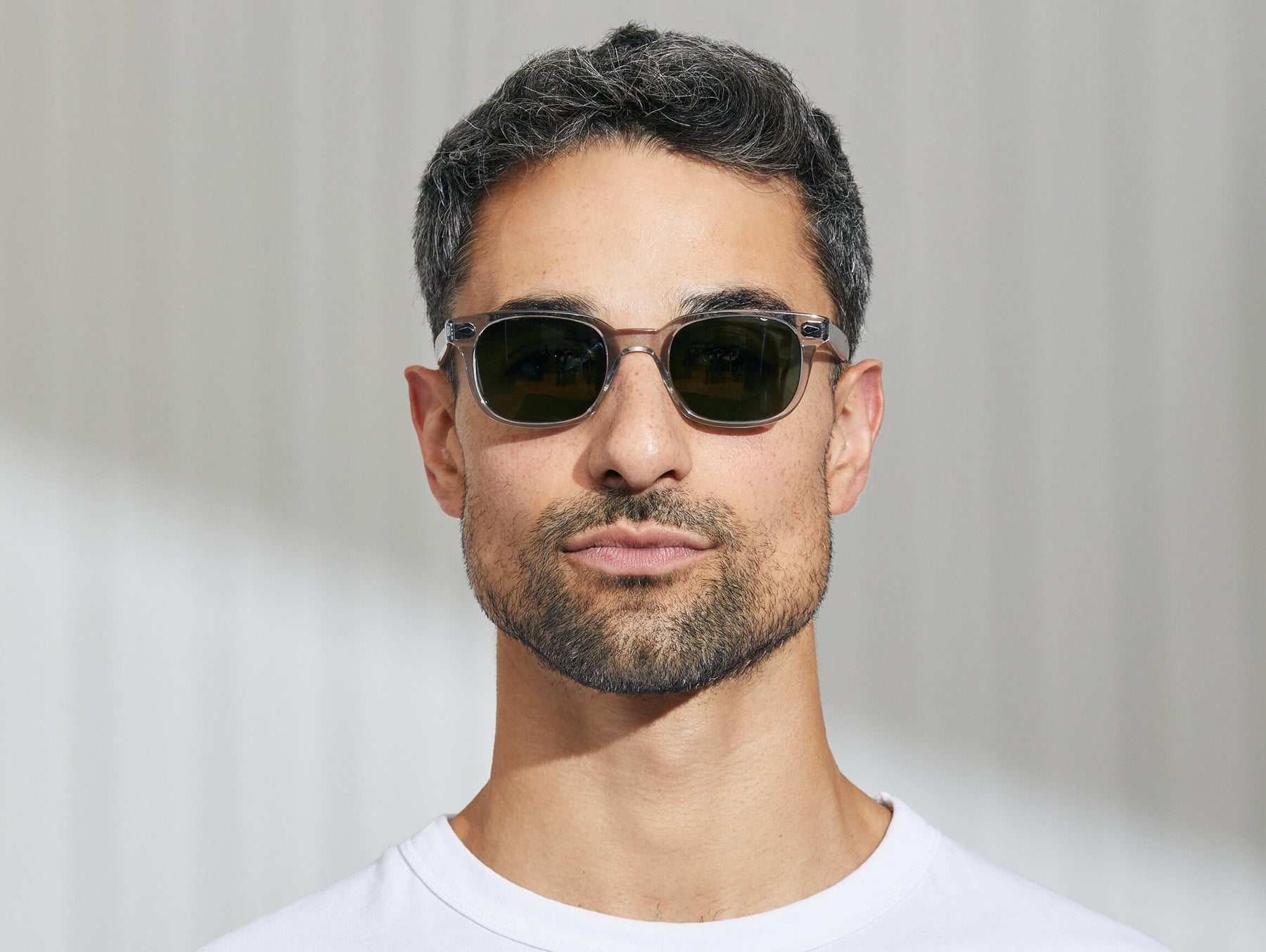Model is wearing The BOYCHIK SUN in Light Grey in size 49 with G-15 Glass Lenses