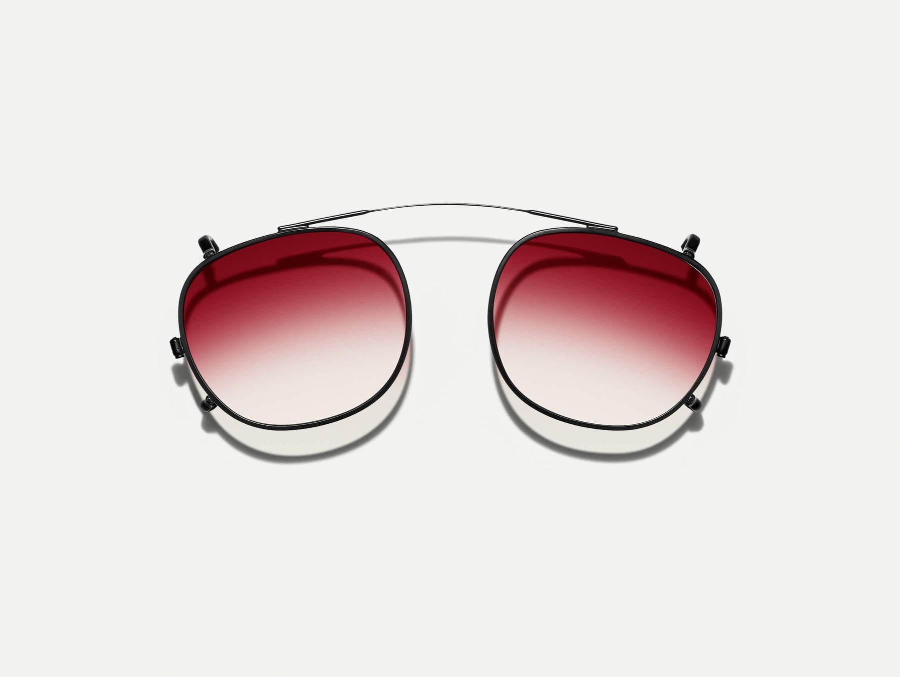 The CLIPTOSH in Matte Black with Big Apple Fade Tinted Lenses