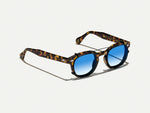 The CLIPTOSH in Matte Black with Broadway Blue Fade Tinted Lenses