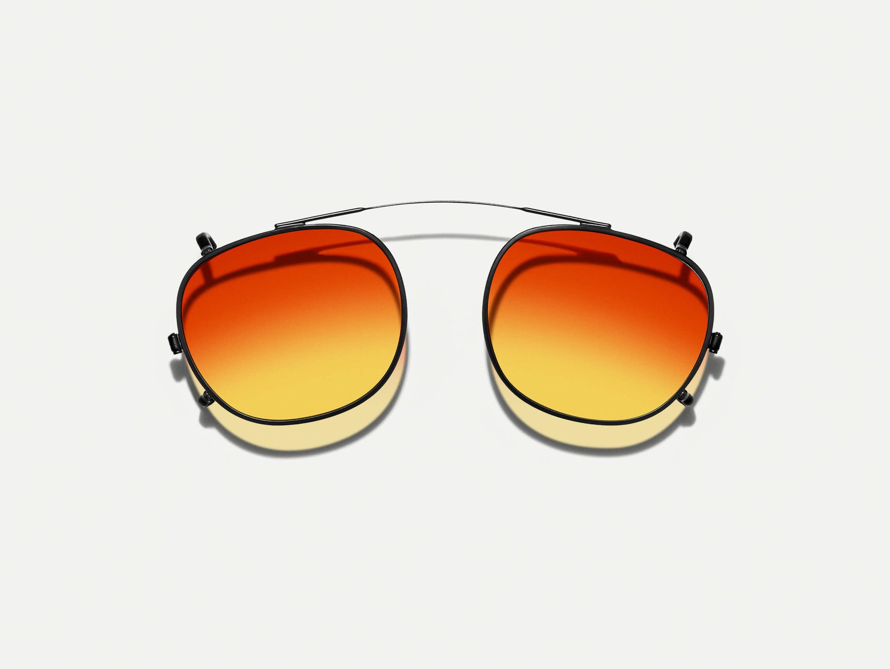 The CLIPTOSH in Matte Black with Candy Corn Tinted Lenses