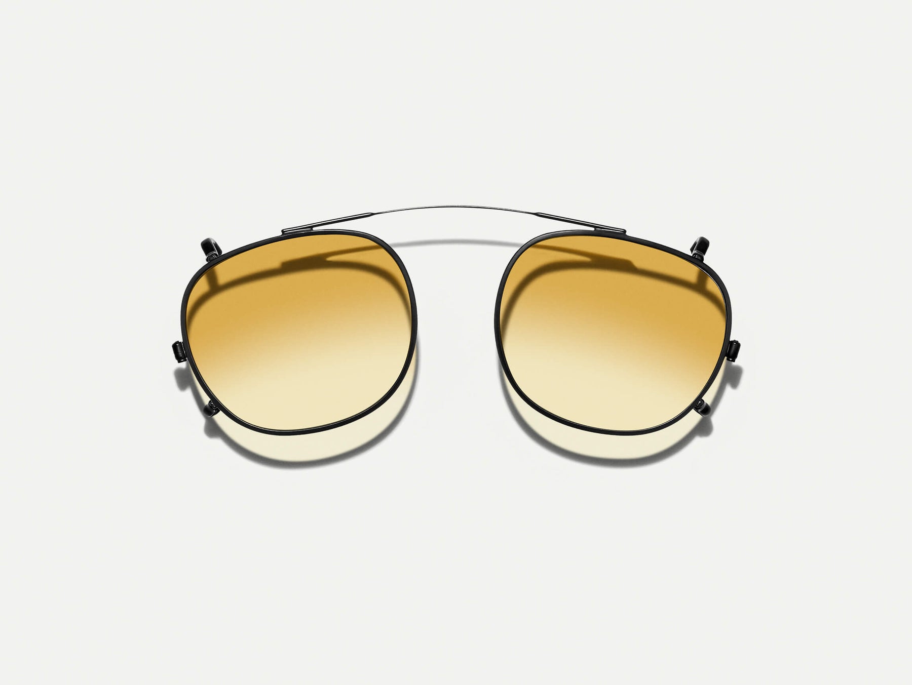 The CLIPTOSH in Matte Black with Chestnut Fade Tinted Lenses