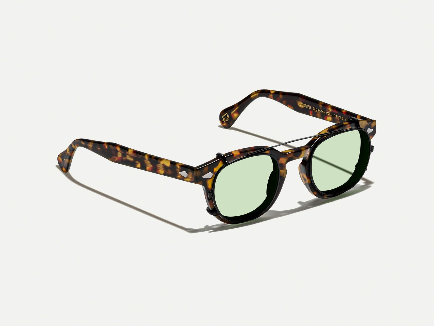 The CLIPTOSH in Matte Black with Limelight Tinted Lenses