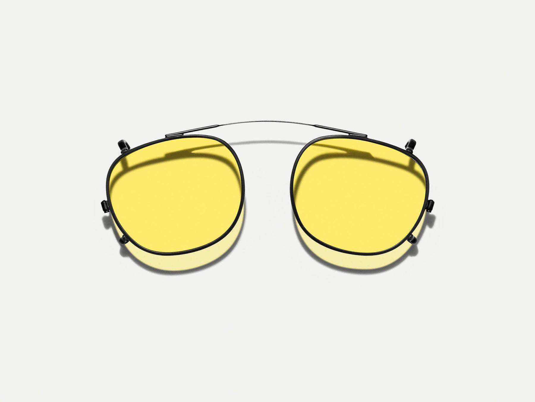 The CLIPTOSH in Matte Black with Mellow Yellow Tinted Lenses