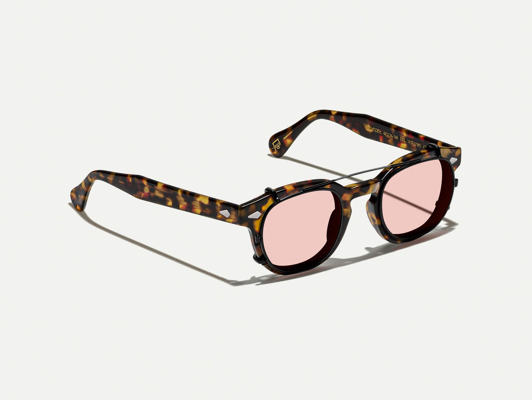 The CLIPTOSH in Matte Black with New York Rose Tinted Lenses