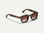 The CLIPTOSH in Matte Black with Root Beer Fade Tinted Lenses
