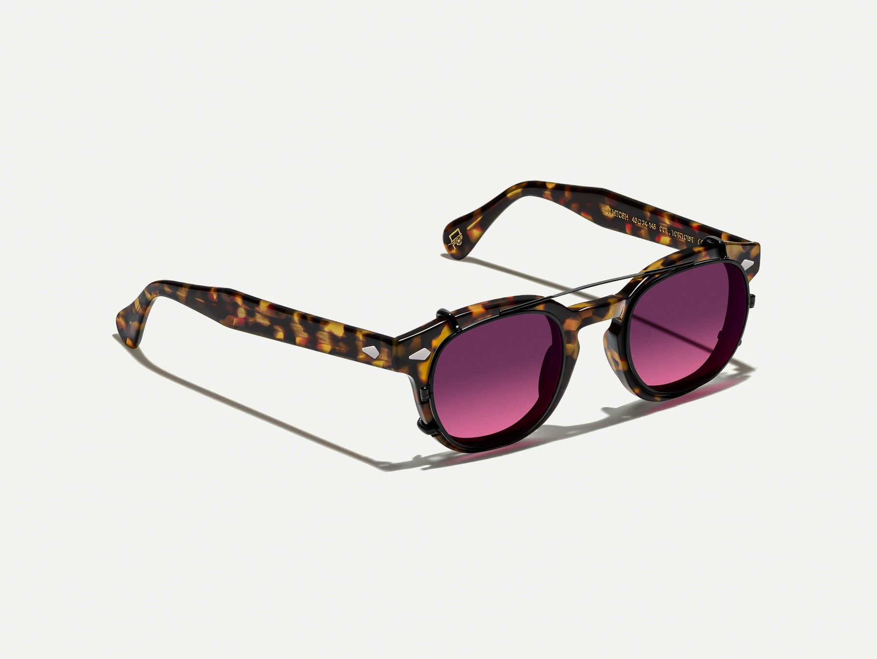 The CLIPTOSH in Matte Black with Westside Sunset Tinted Lenses