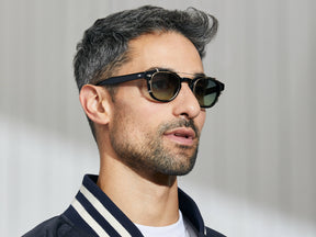 Model is wearing The CLIPTOSH in Gold in size 46 with Forest Wood Tinted Lenses