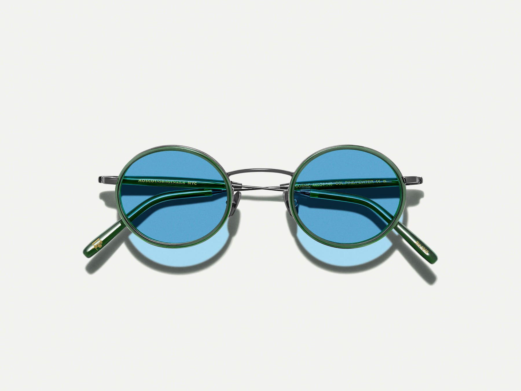 The COSNIC SUN in Pine with Celebrity Blue Tinted Lenses