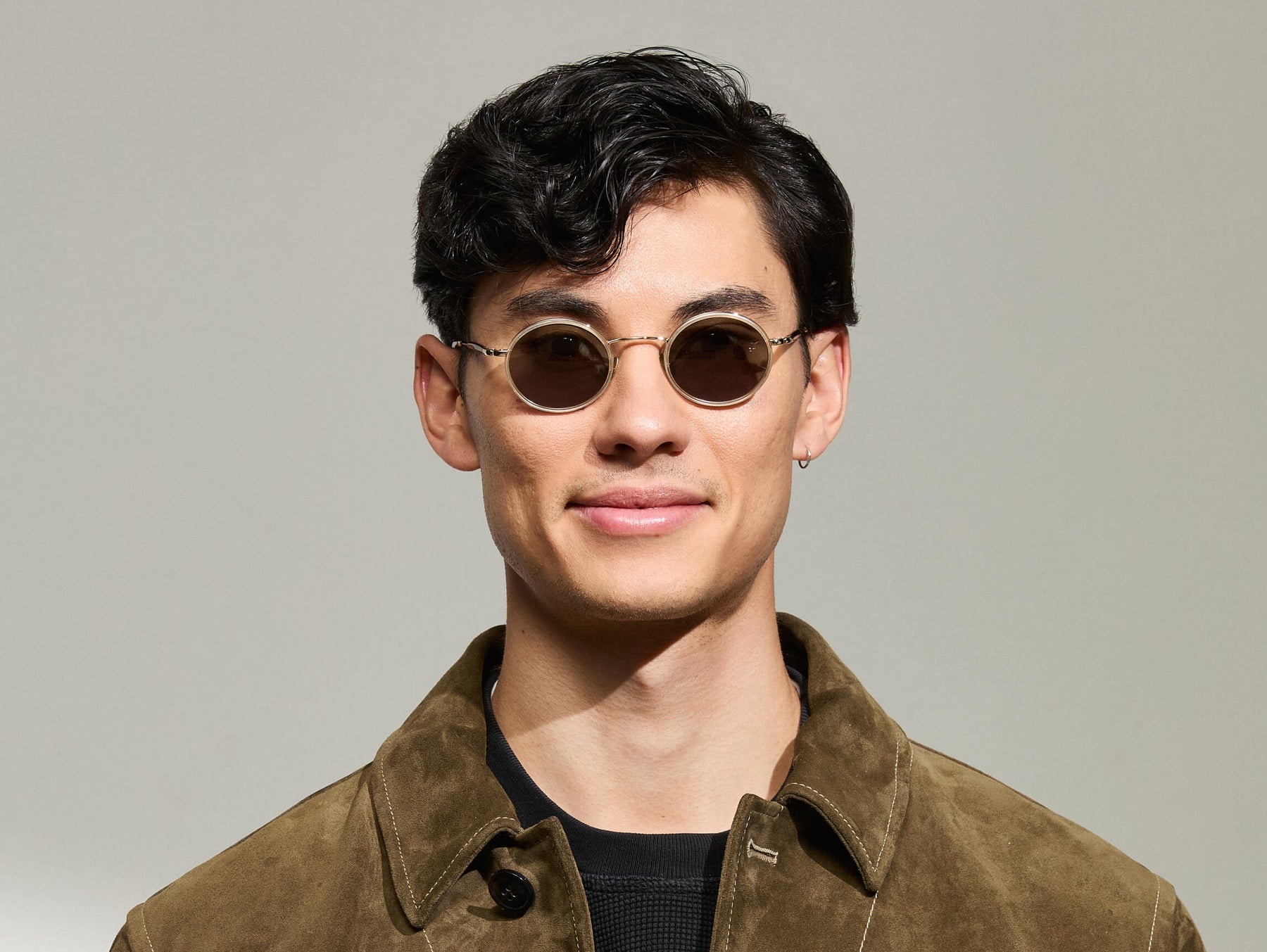 Model is wearing The COSNIC SUN in size 44 in Flesh-Dark Brown with G-15 Tinted Lenses