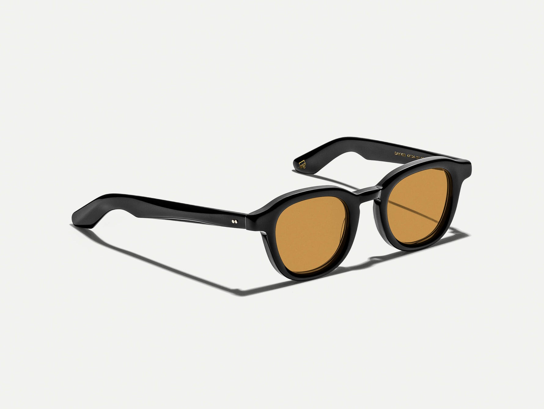 The DAHVEN Black with Amber Tinted Lenses