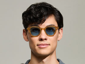 Model is wearing The DAHVEN in Blonde size 47 with BLUE+ Tinted Lenses