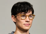 Model is wearing The DAHVEN in Blonde size 47 with BLUE+ Tinted Lenses