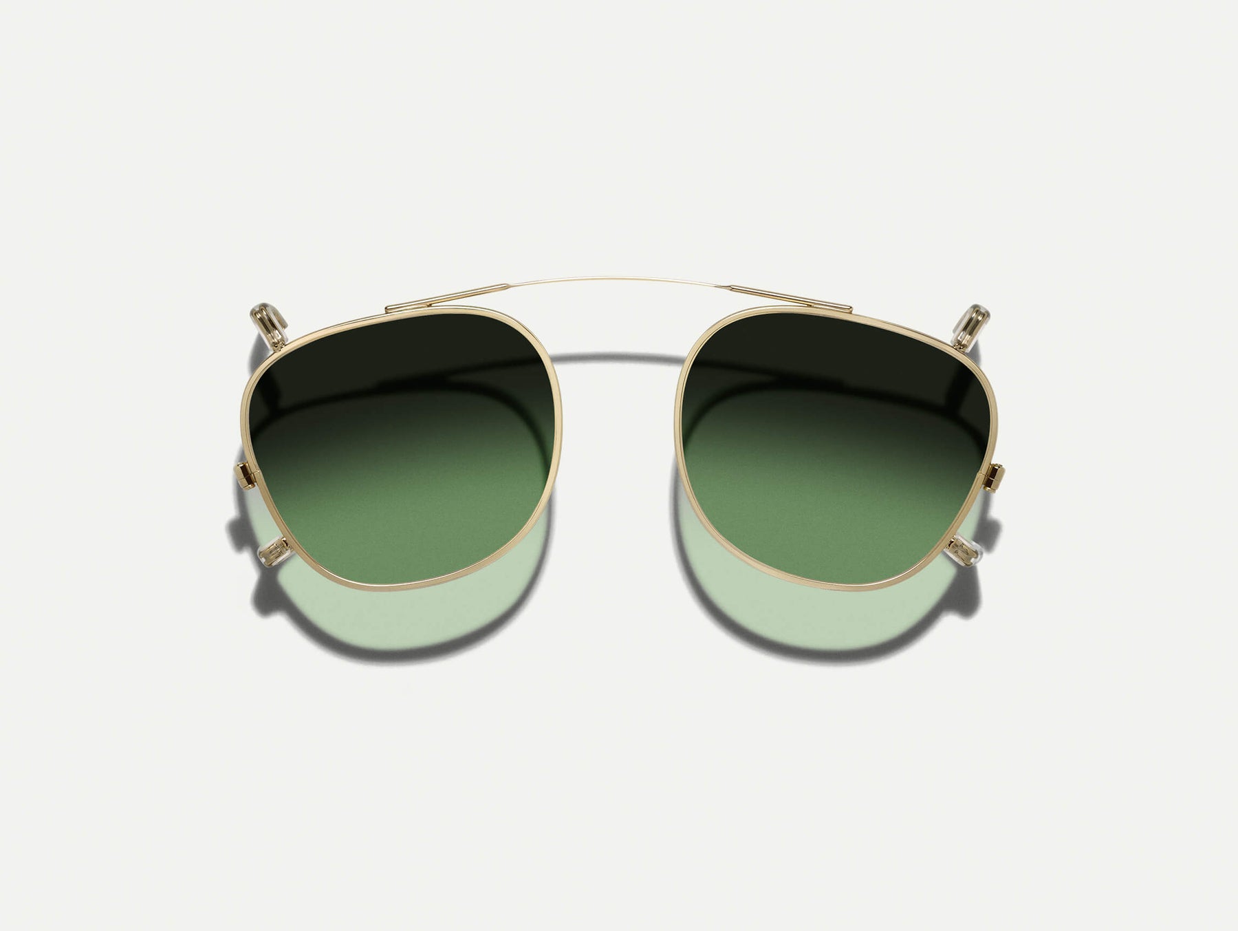 The DAHVEN CLIP in Gold with Forest Wood Tinted Lenses