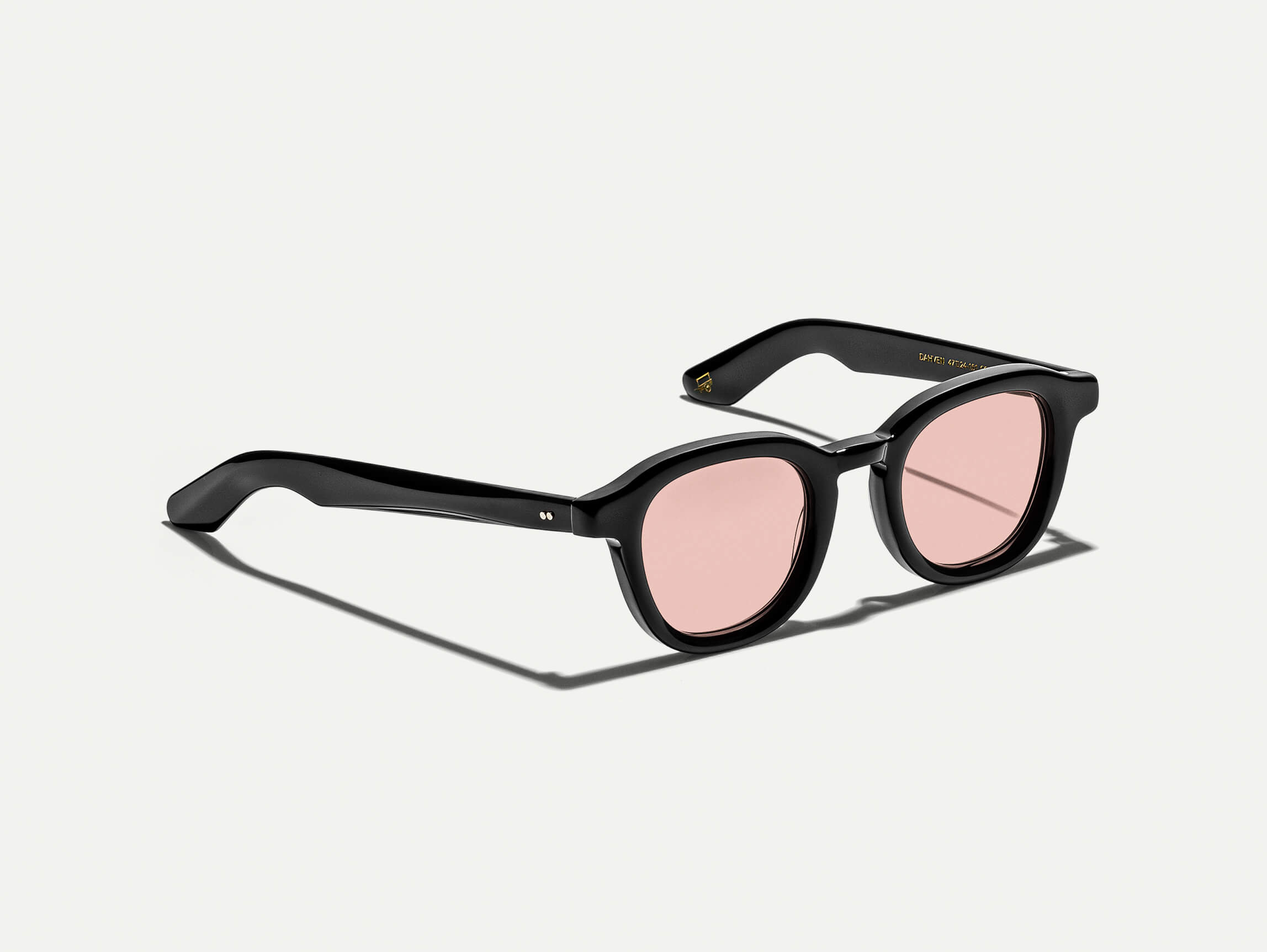 The DAHVEN Black with New York Rose Tinted Lenses