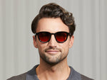 Model is wearing The DAHVEN in Black in size 50 with Cabernet Tinted Lenses