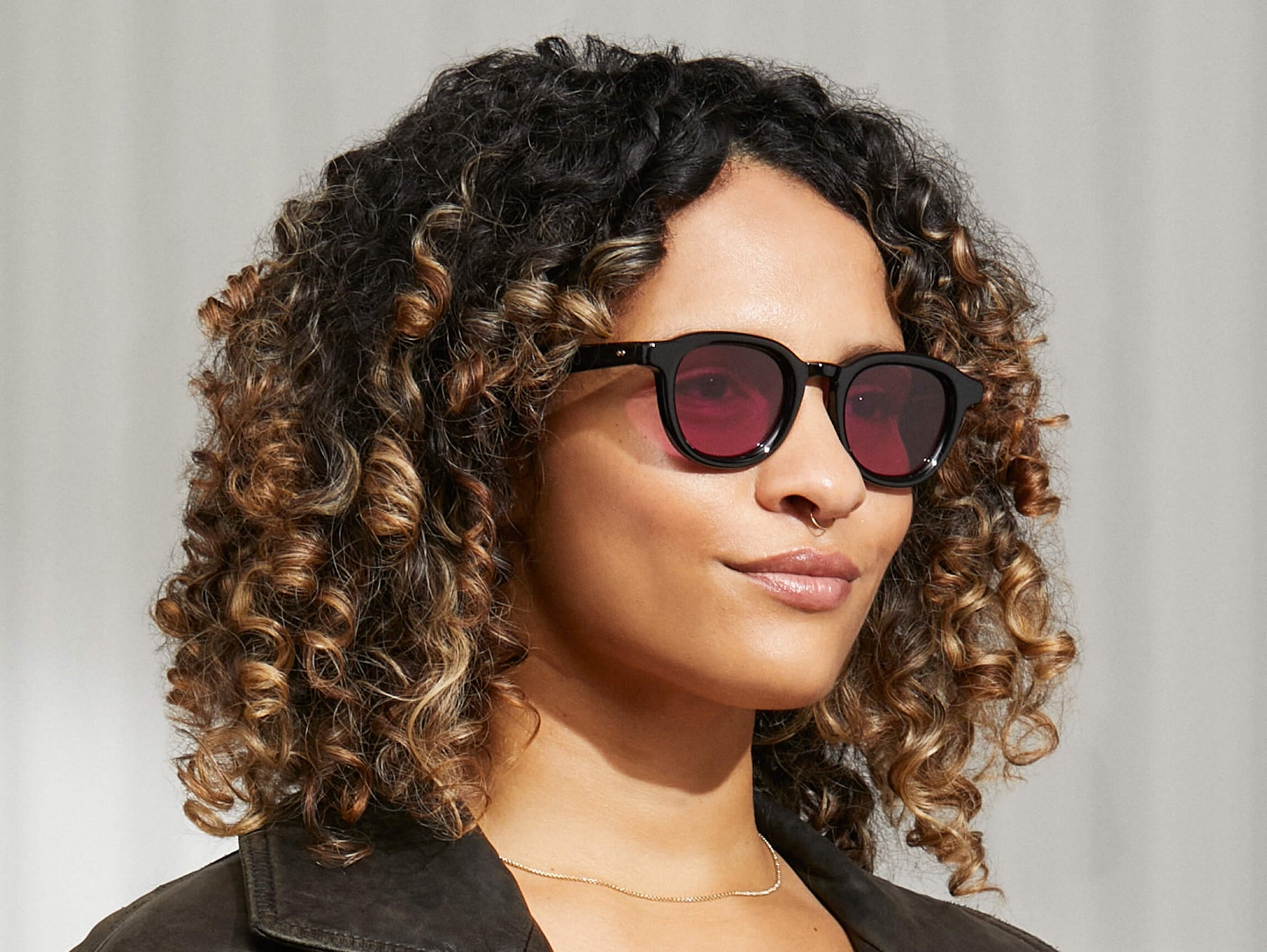 Model is wearing The DAHVEN in Black in size 47 with Purple Nurple Tinted Lenses