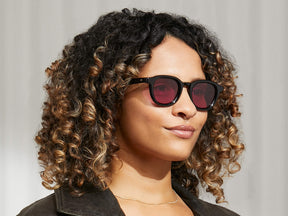 Model is wearing The DAHVEN in Black in size 47 with Purple Nurple Tinted Lenses