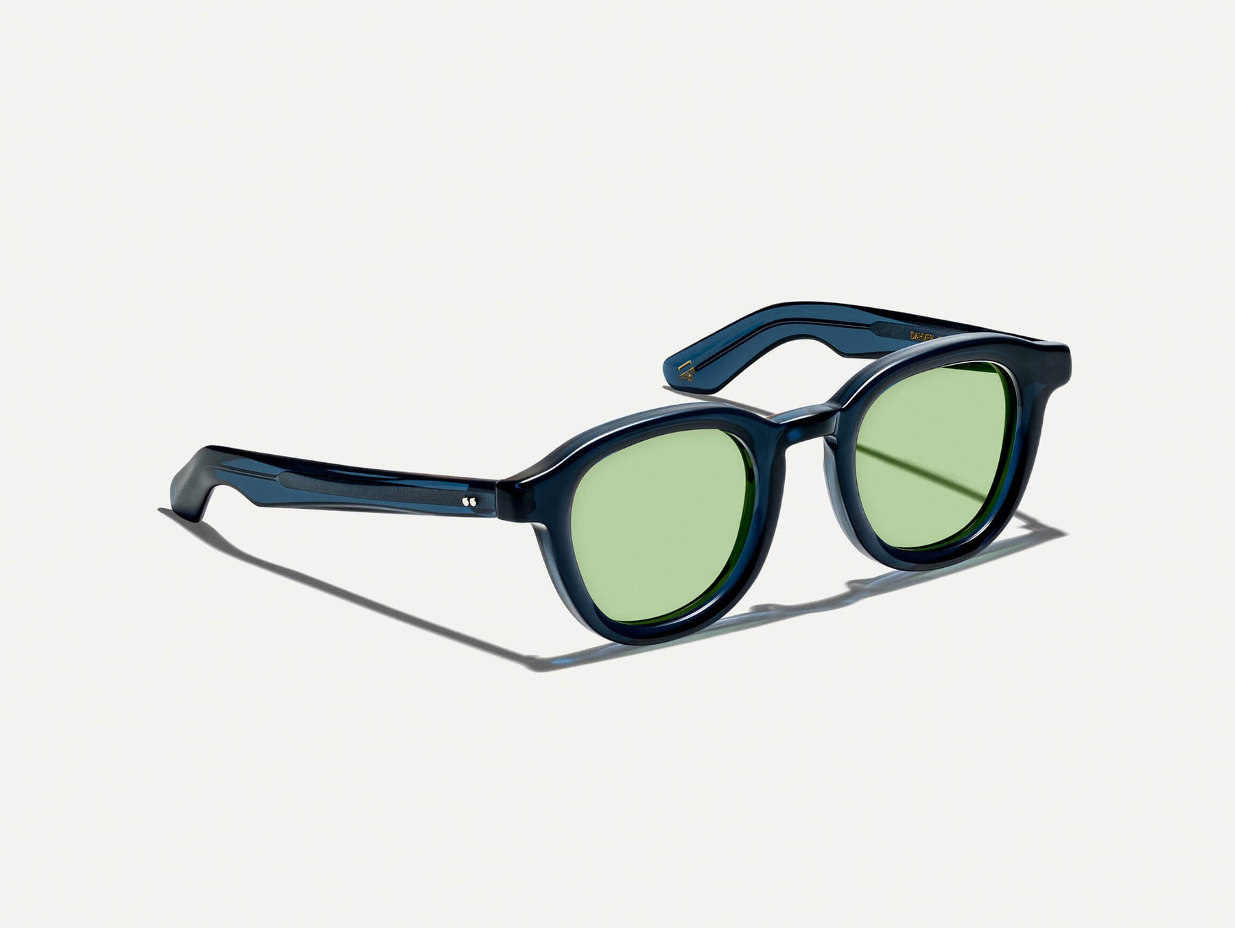 The DAHVEN in Navy with GREEN+ Tint
