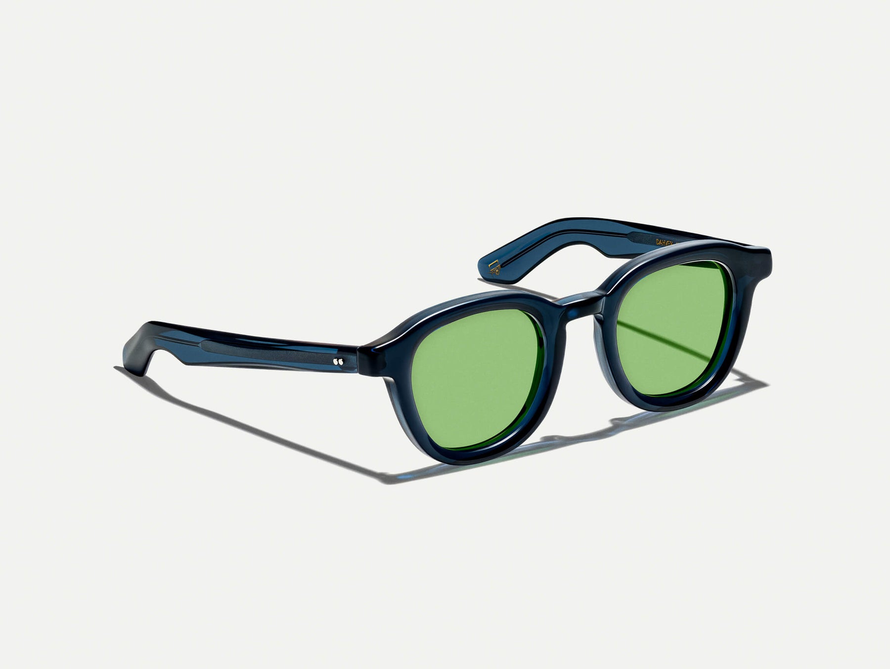 The DAHVEN in Navy with GREEN+ Tint